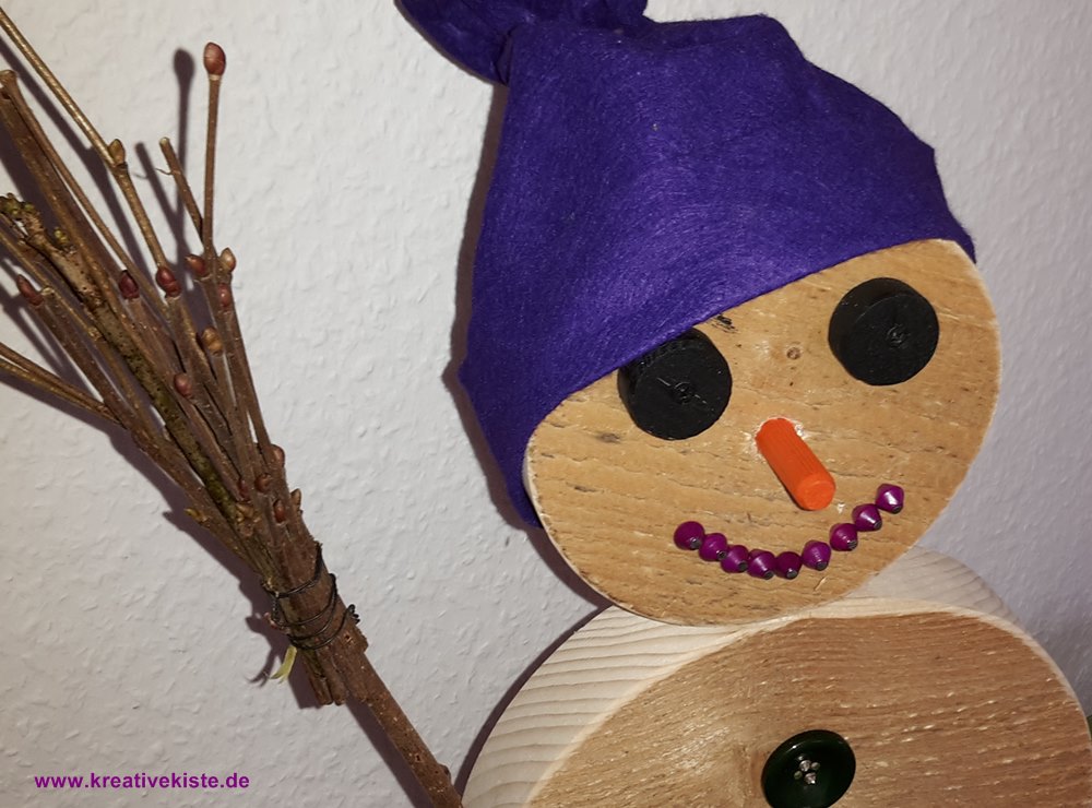 schneemann mit kindern aus holz bauen